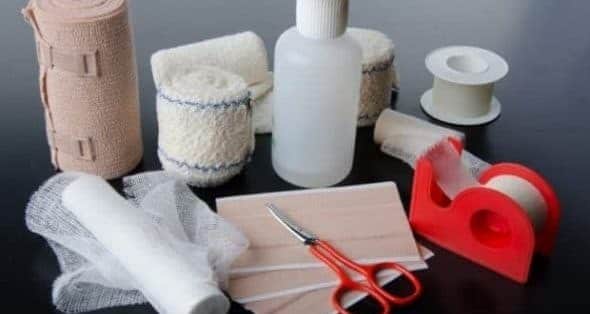 wound care products- bandages, alcohol pads,medical tapes and a pair of scissors