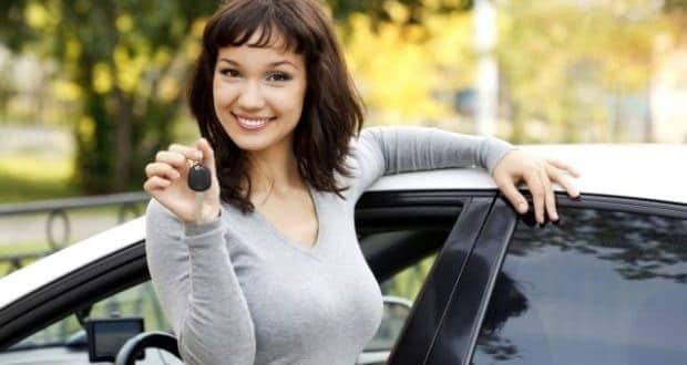 Pre-approved car loas-a woman holding a car key