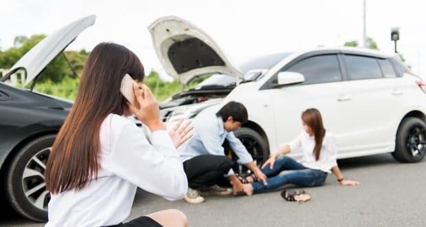 personal injury lawyer-a woman on the phone with a personal injury lawyer after an auto crash