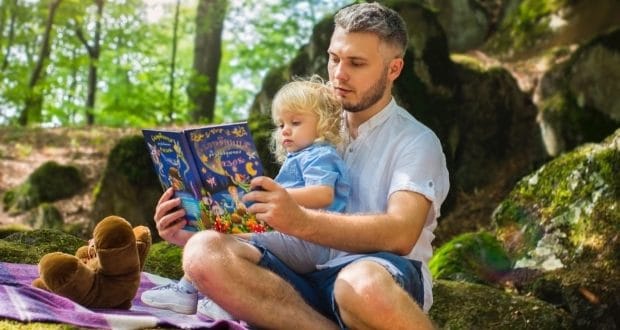 Ways a single parent can balance life-a man reading to his child