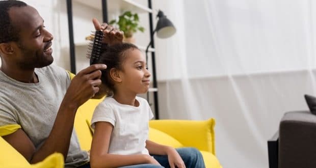 How to connect with your daughter - a dad making his daughters hair