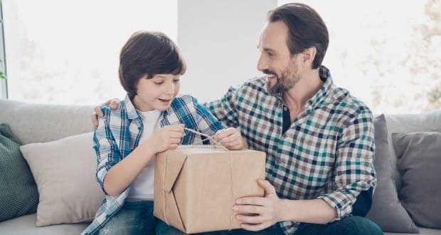 Perfect gifts for fathers and sons-a dad and son unboxing a gift