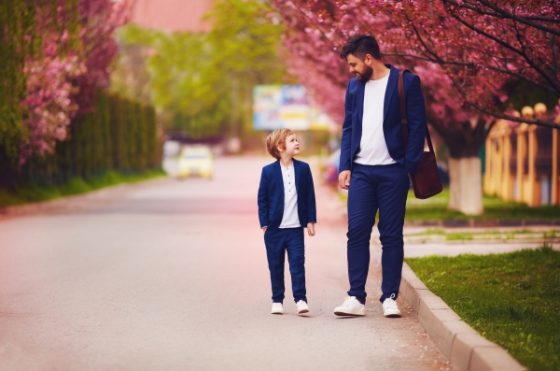 perfect gifts for fathers and sons- a dad and son wearing matching outfits