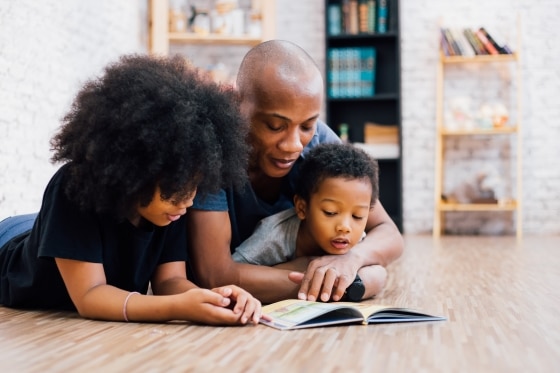 how to supplement your child's education during Covid-19 - stepdad reading to his stepchildren