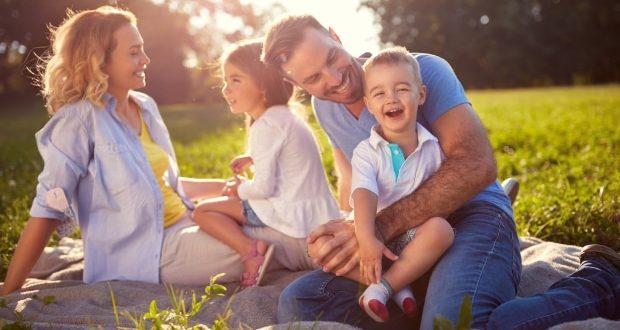 Ways to have outdoor fun in your house-a family enjoying the outdoors