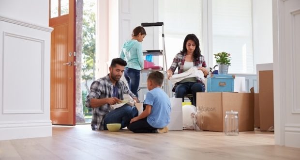 Tips to help move your family out of State-A family packing things into boxes