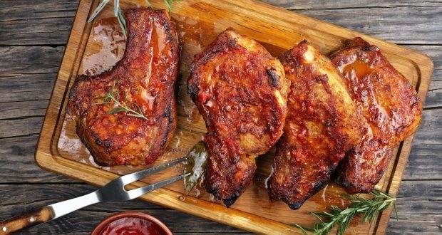 Picture of roasted juicy pork chops on board