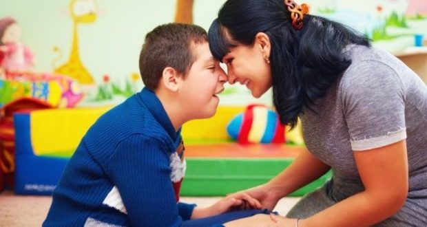 Care for a child with special needs-a mom with her special needs kid