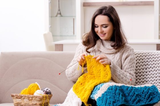 Things a therapist will recommend to improve mental health-A young lady knitting