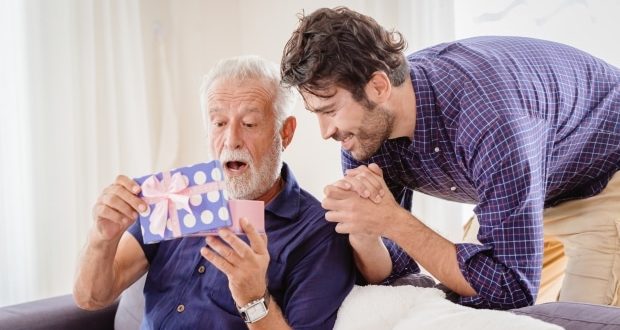 How to surprise your stepdad-A dad receiving a surprise gift from son