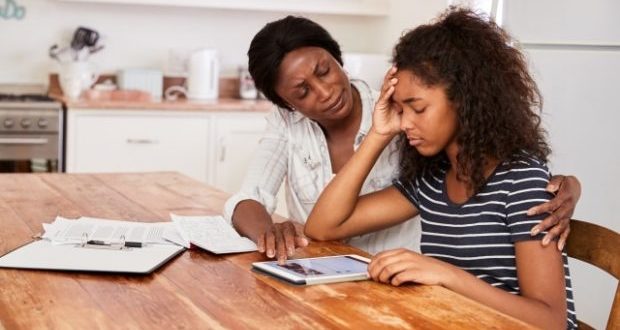 Help your teen with anxiety and depression- Mom talking with anxious girl