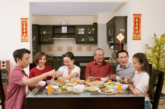 Ways to make lasting family moments- Family having dinner
