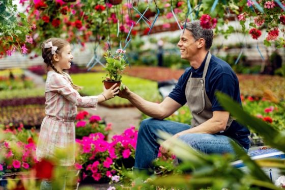 Helping your child find their voice - dad and daughter in a garden