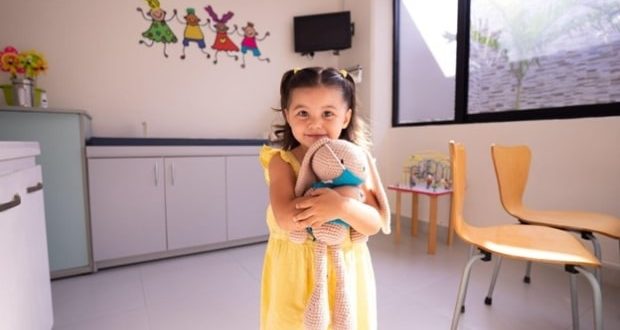 Hepatitis and children - Cute little girl embracing rabbit doll - Hepatitis and your children