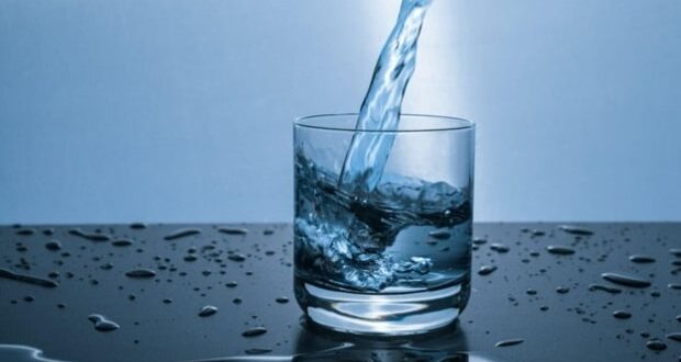 The importance of hydration-pouring water into a glass