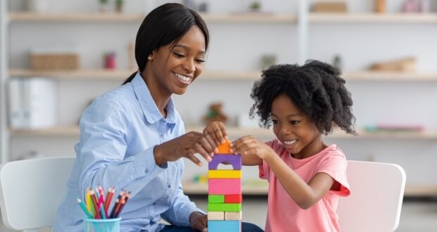 The cost of raising a child - mother and child building blocks.