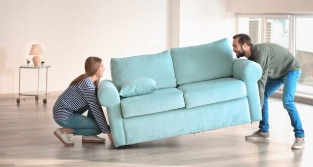Benefits of using Furniture Rental - Couple moving furniture