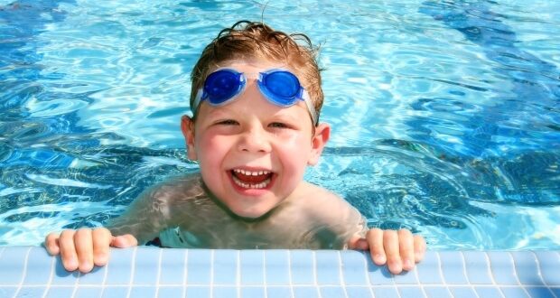 Learn how to swim-Happy child swimming