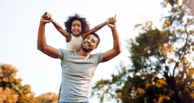 Is It Shameful To Be A Stepdad? - A stepdad carrying his stepdaughter on his shoulders