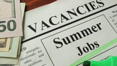 Newspaper with ads summer jobs vacancy.