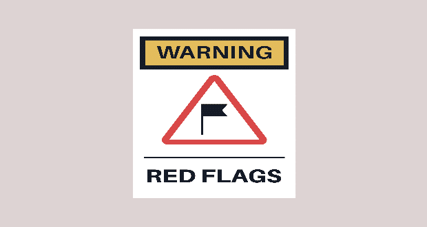 Sign stating warning red flags
