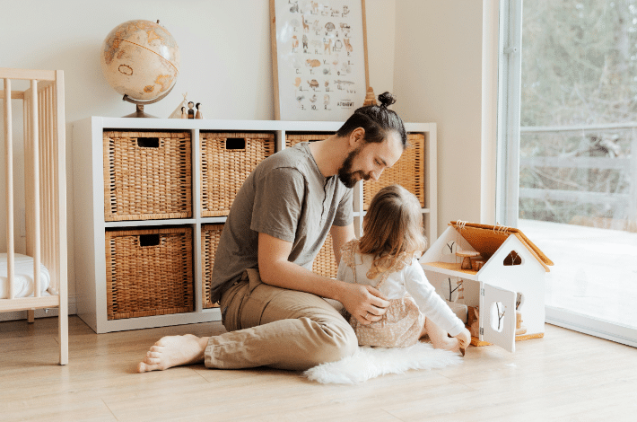 The Importance Of Self-Love For Stepfathers - A happy stepdad tending to his stepkid