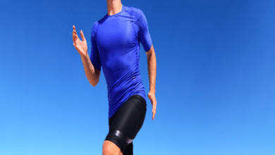 Sport runner male athlete running in compression sportswear clothing
