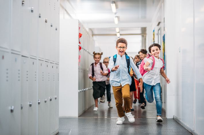 Back to school - Scholl kids running in the hall way