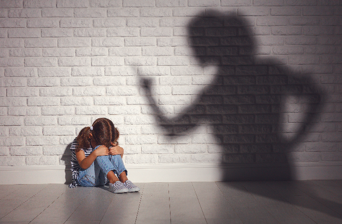 abusive ex. angry mother scolds frightened daughter .