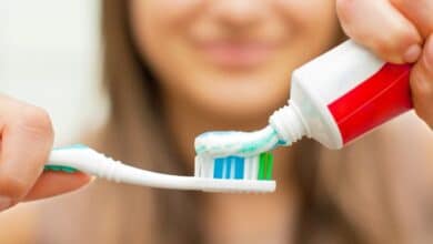 Fluoride benefits and risks-Toothbrush with toothpaste