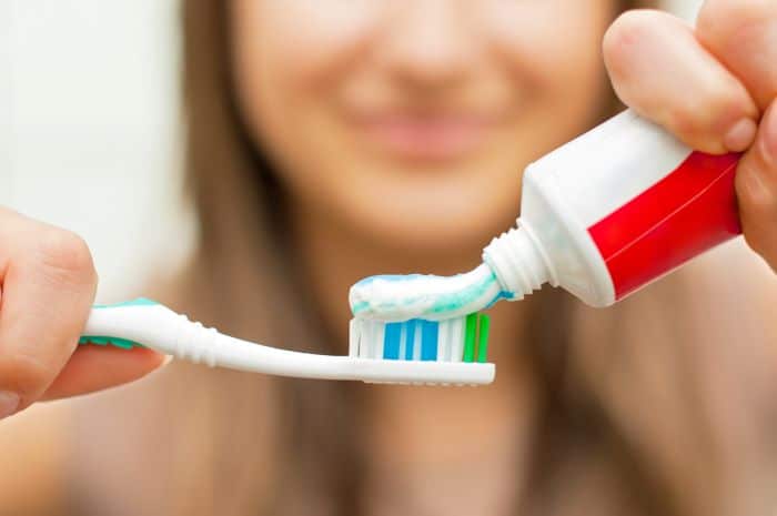 Fluoride benefits and risks-Toothbrush with toothpaste