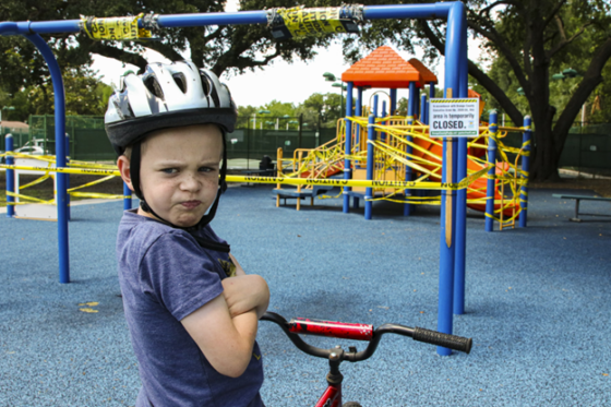 Disappointed boy at park