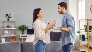 why stepfamilies fail-Emotional stressed young couple having argument at home.