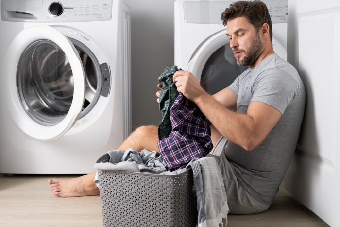 acts of service love language-Husband helping with laundry
