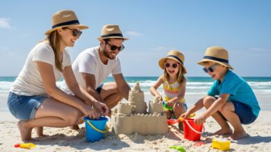 Love language of quality time -A joyful stepfamily spending quality time together at the beach, building a sandcastle in the sunshine.