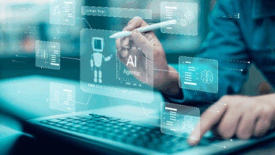 Game-Changing Tech Trends- close-up of a person's hand holding a stylus interacting with a touchscreen