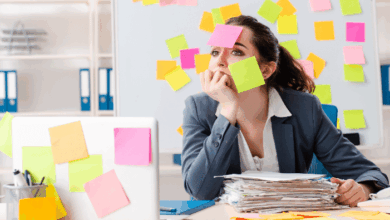 National Workaholics Day - Women with paperwork and post it