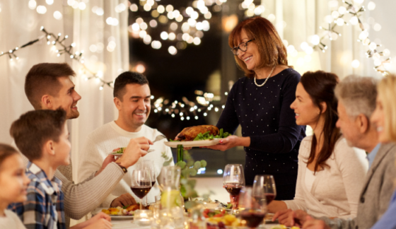 Holiday stress in blended families- family enjoying dinner