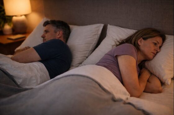 Stepdad Burnout - Couple in bed turned away from each other