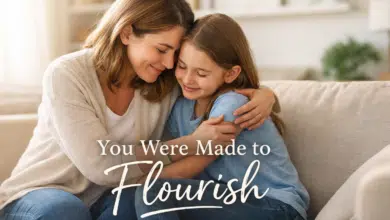 A stepmom kneeling or sitting beside a child, offering encouragement or a gentle hug.