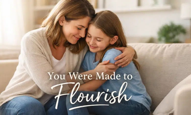 A stepmom kneeling or sitting beside a child, offering encouragement or a gentle hug.