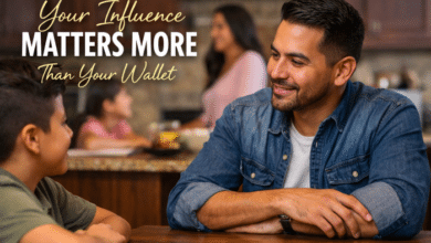 A stepfather sitting at a kitchen table with family in the background. The children are interacting with him while the headline text overlay reads