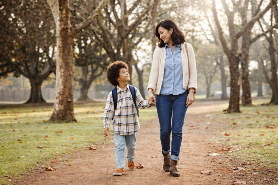 Stepmom walking her stepson to school