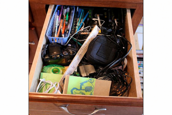 Spring Cleaning Humor - Cluttered desk drawer filled with stuff