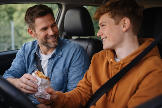 Stepdad and stepson sharing a cheerful moment
