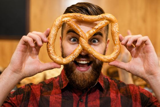 Twisted Logic - Stepdad clowning with a pretzel