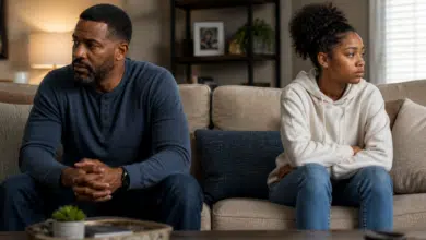 How to Connect With A Teen Stepdaughter -Stepdad and teen stepdaughter in the same space, slightly apart, both calm but not engaging.
